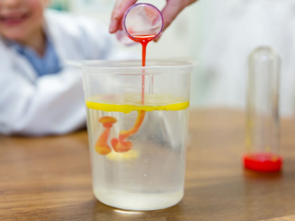 children carrying out science experiments at a London prep school