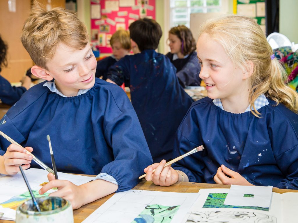 children painting together at a London prep school