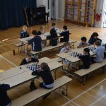 Students playing chess