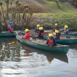 students in they kayaks