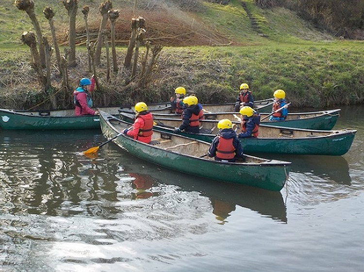 students in they kayaks