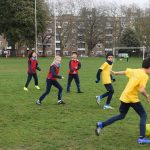 children playing football