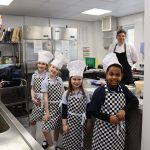 Students in chef's attire
