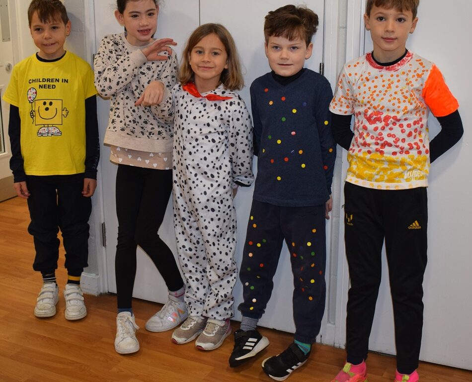 students in spotty clothes