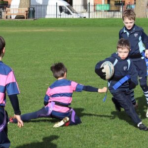 students playing rugby